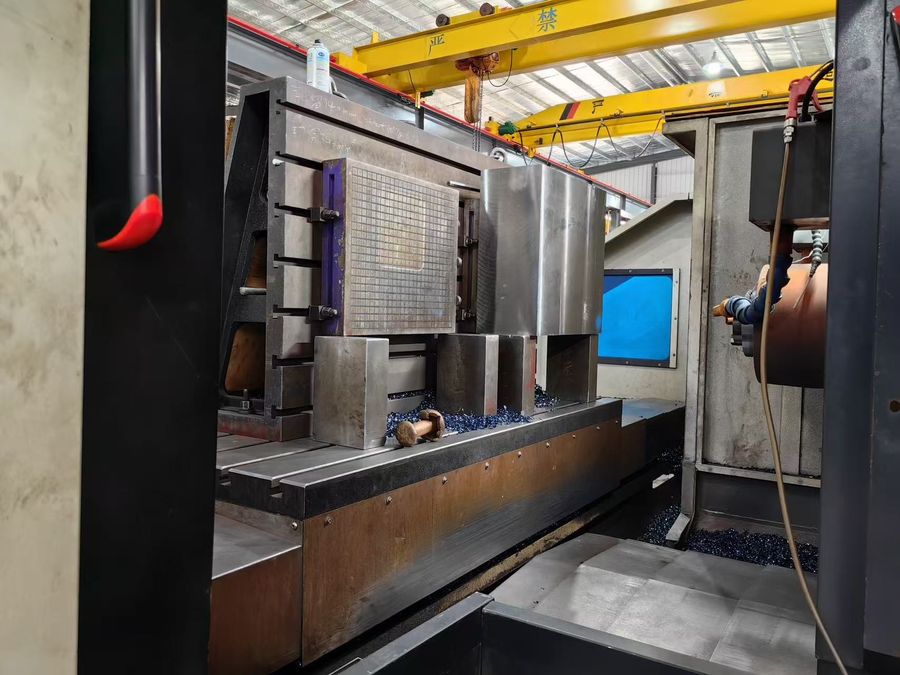Three-axis gantry CNC machining centre cutting a large mold plate