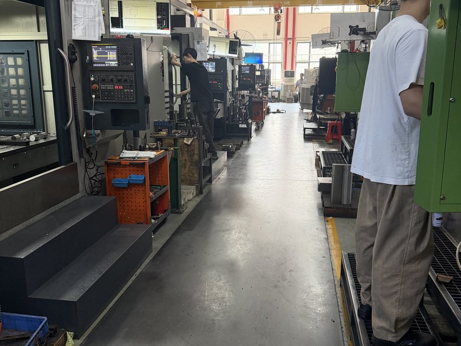 Operator at a machining centre in Factory Area 3