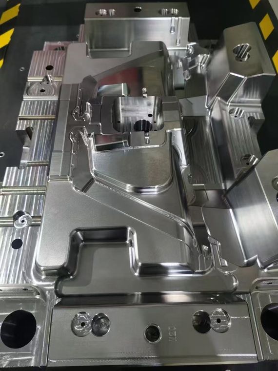 Precision ground mold core with complex polished surface